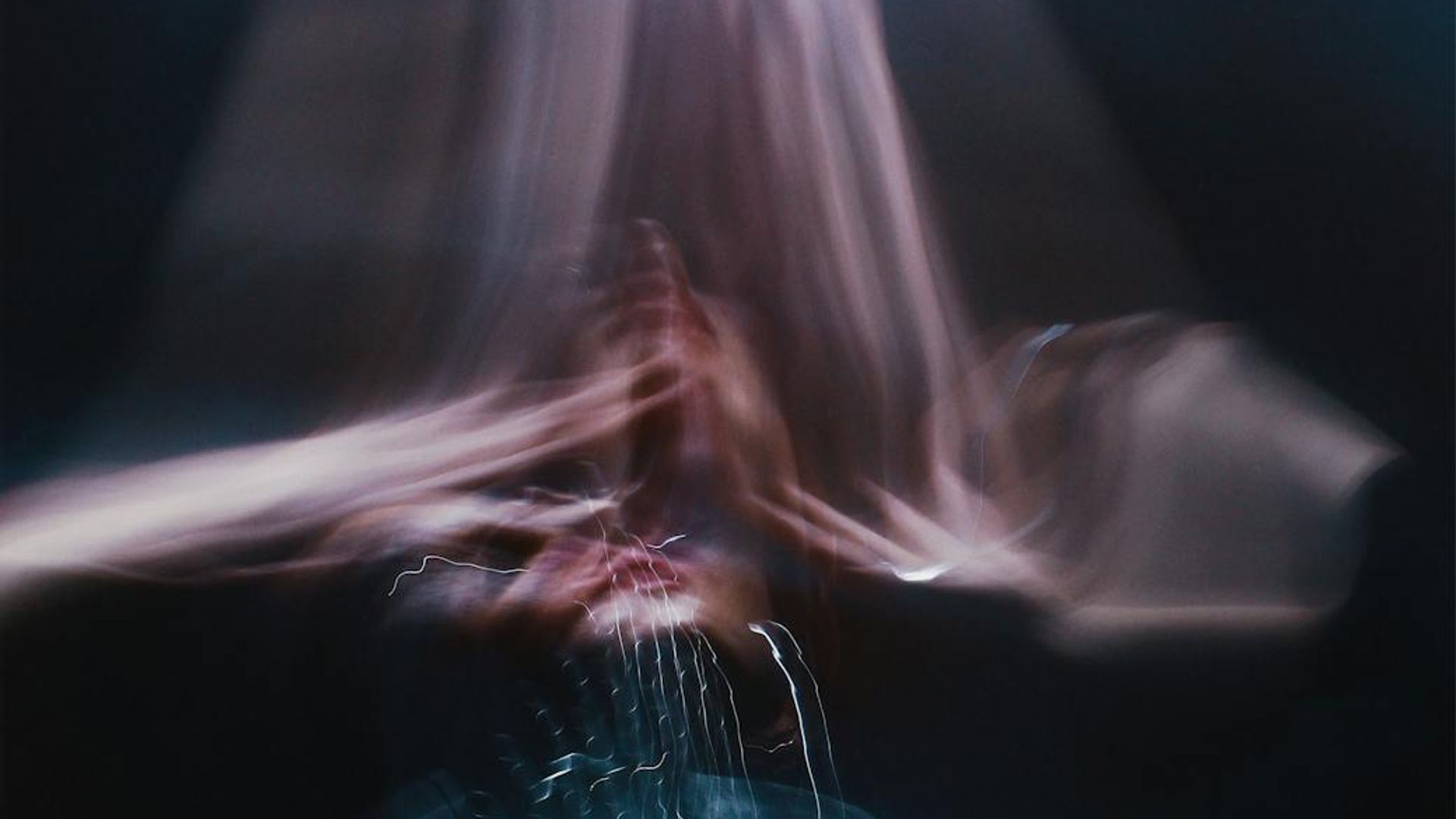 Abstract gentle light trails suggesting focus and movement.